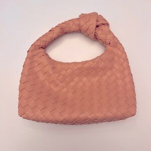 Pink small woven slouchy designed handbag new without tags